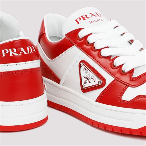 dark red prada sneakers|red round pradas.